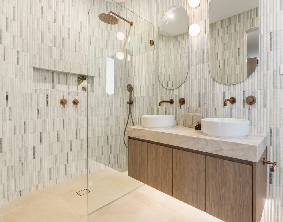 Vertical stack tiled feature wall with a pendant light