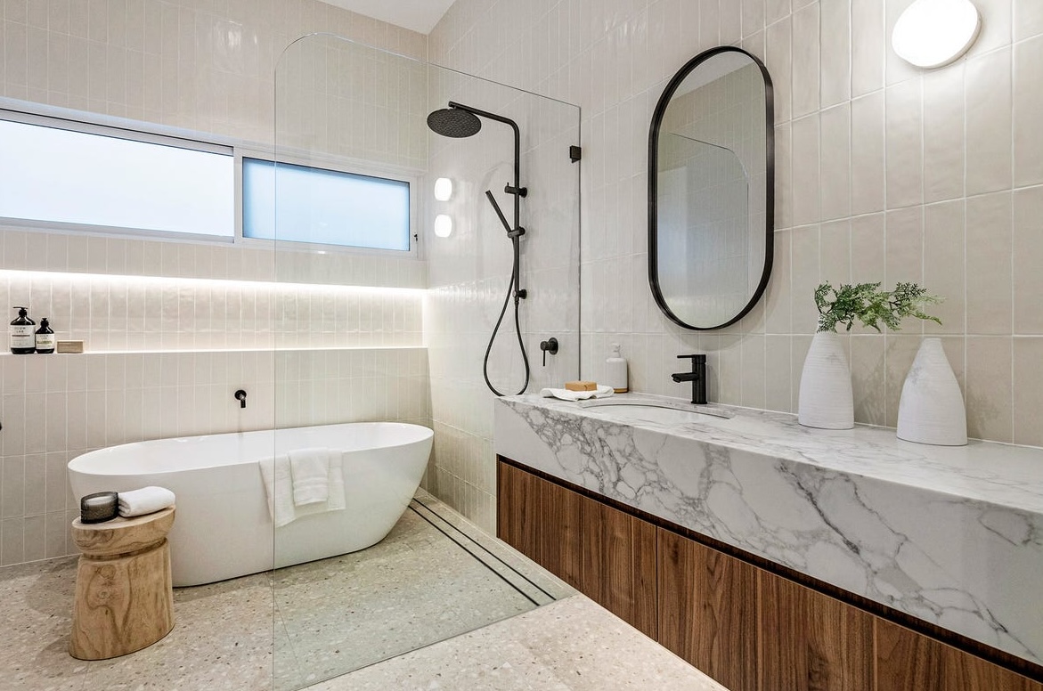 Complete bathroom renovation with a freestanding bath and timber vanity, Sydney