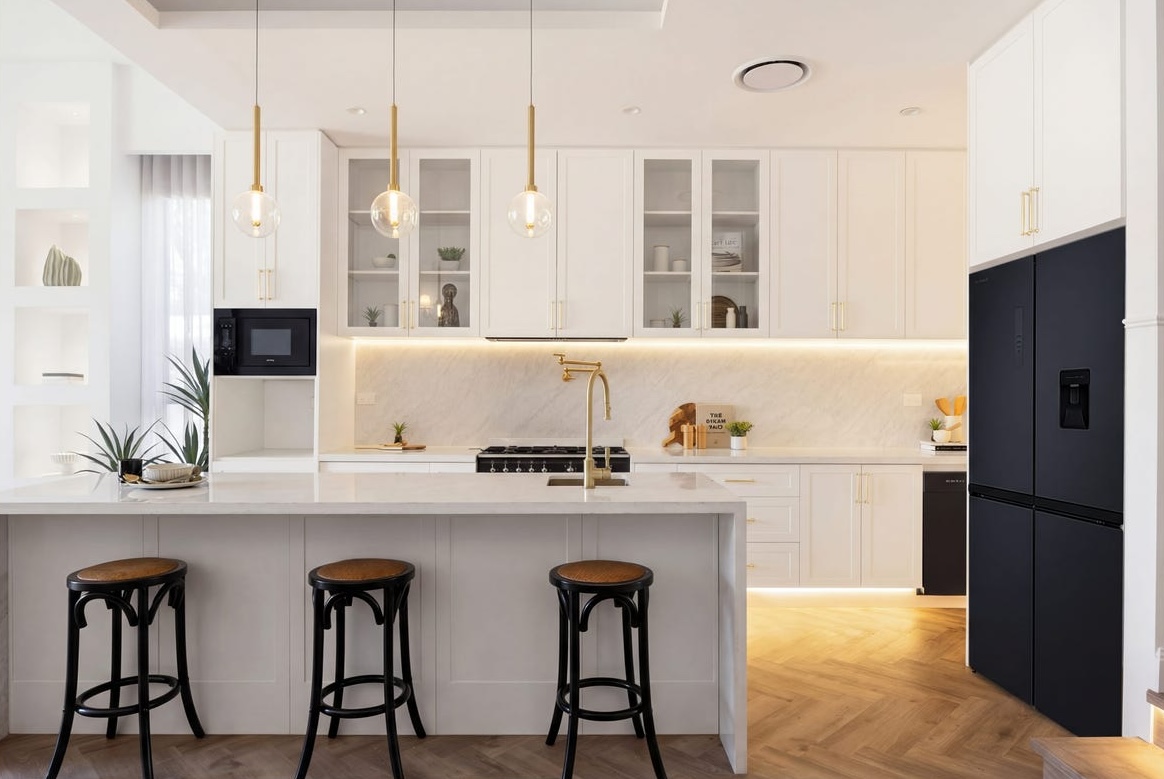 Herringbone timber flooring and pendant lighting in a Sydney kitchen